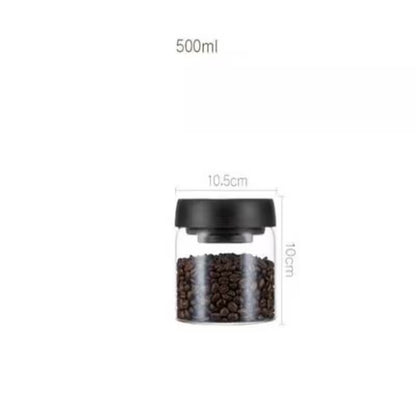 Glass container with black lid filled with coffee beans, showing dimensions on a white background.