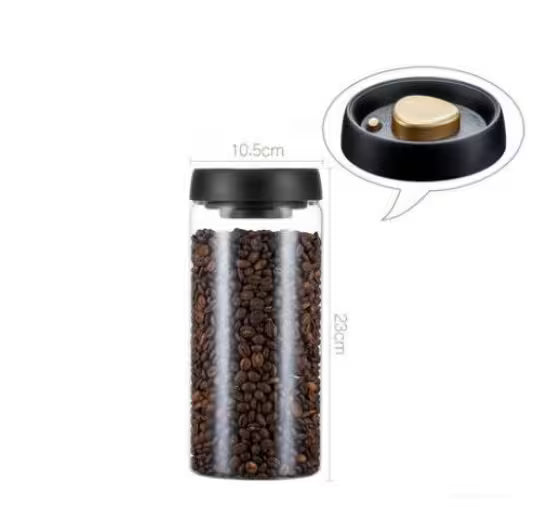Glass container with coffee beans and black lid, showing dimensions on a white background