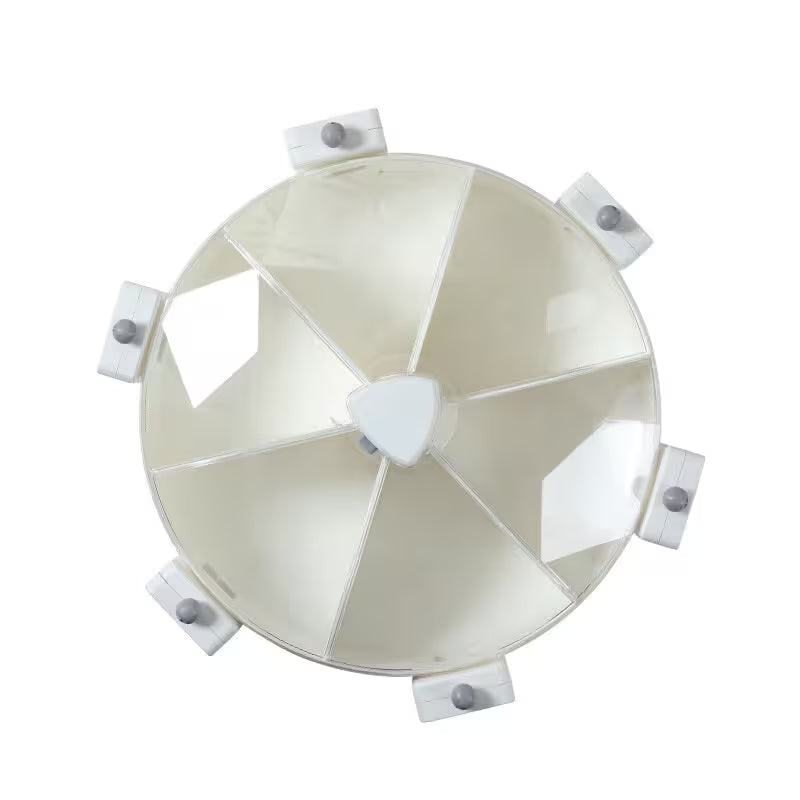 Round white object with multiple sections on a white background