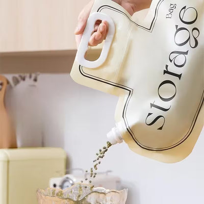 Storage bag being poured with green seeds into a container.