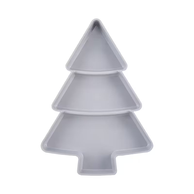 Gray Christmas tree-shaped cake pan on a white background