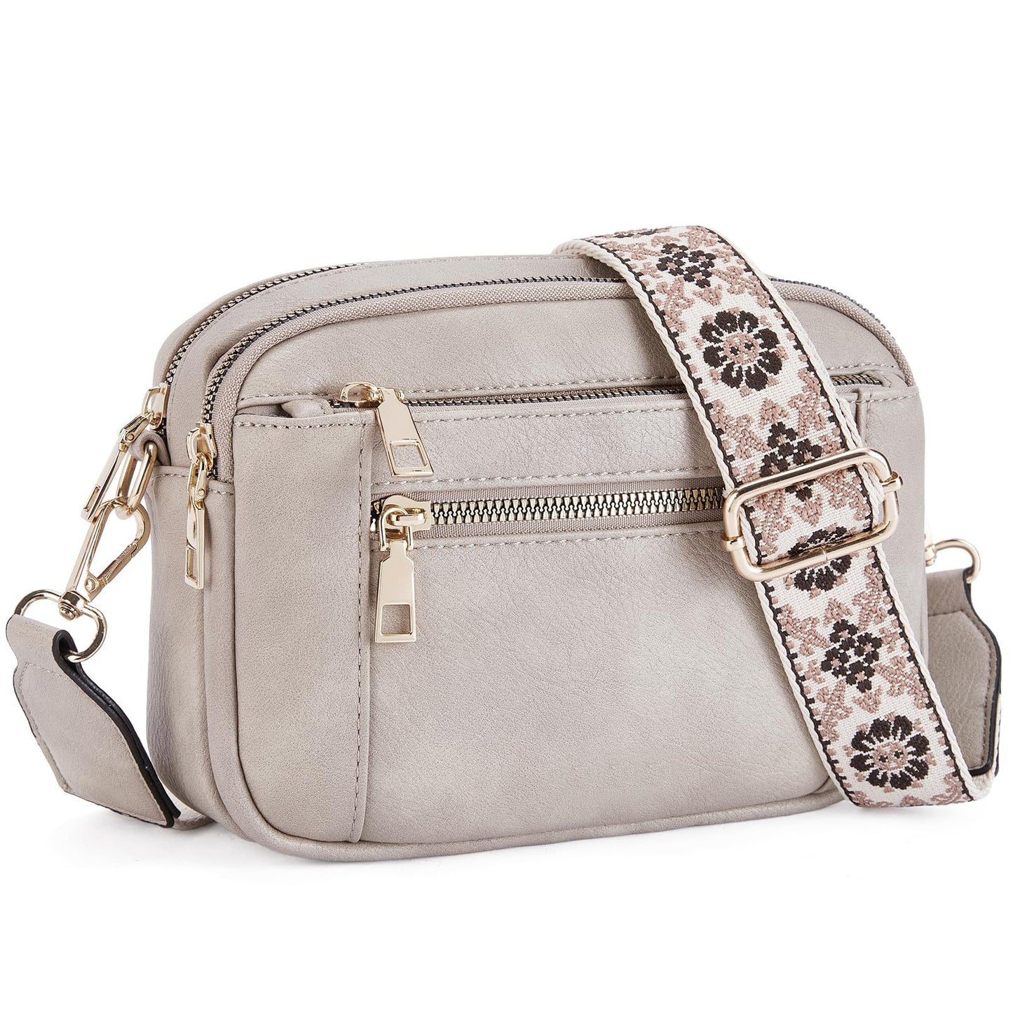 Gray crossbody bag with a floral strap on a white background
