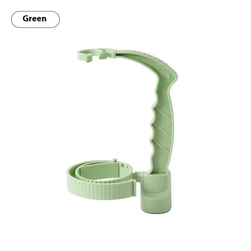 Green plastic clip on a white background