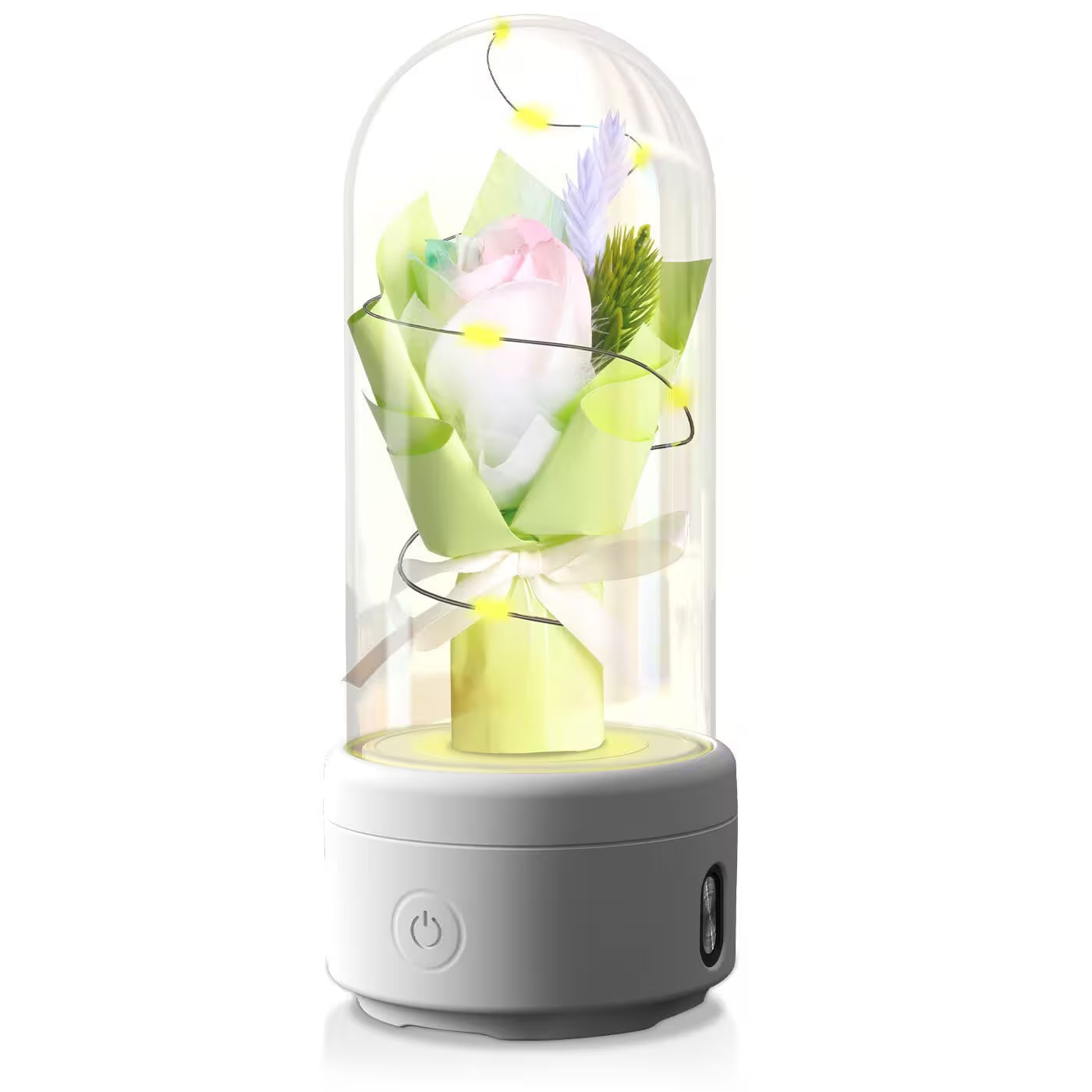 Decorative lamp with flowers inside a glass dome on a white background