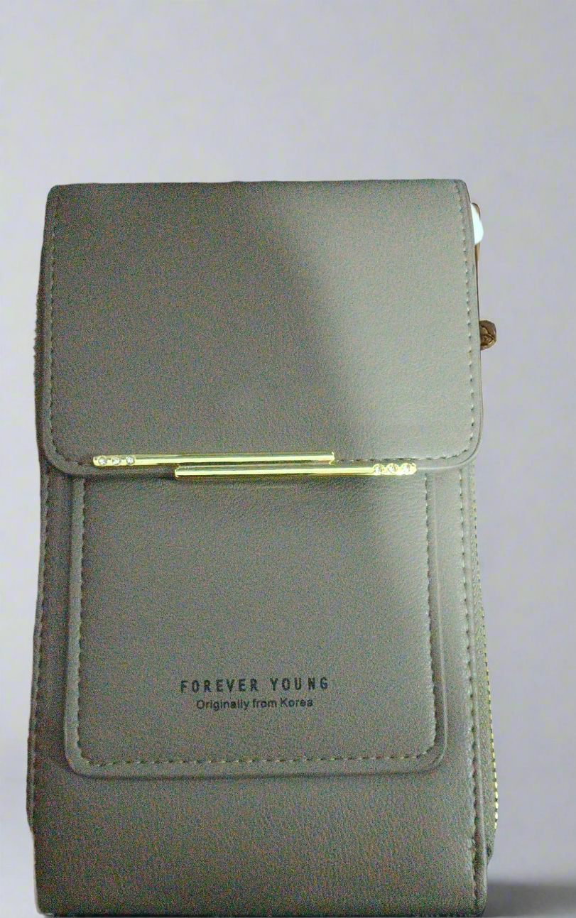 Gray leather wallet with gold accent on a light gray background