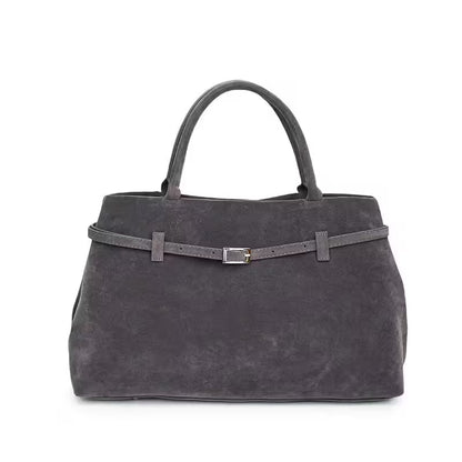 Gray handbag with a belt detail on a white background