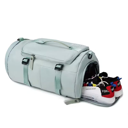 Light blue duffel bag with open top showing colorful sneakers inside on a white background