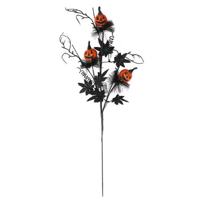 Halloween decorative stem with pumpkins and black leaves on a white background