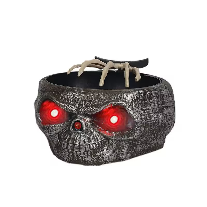 Skull-shaped container with glowing red eyes and a claw on a white background