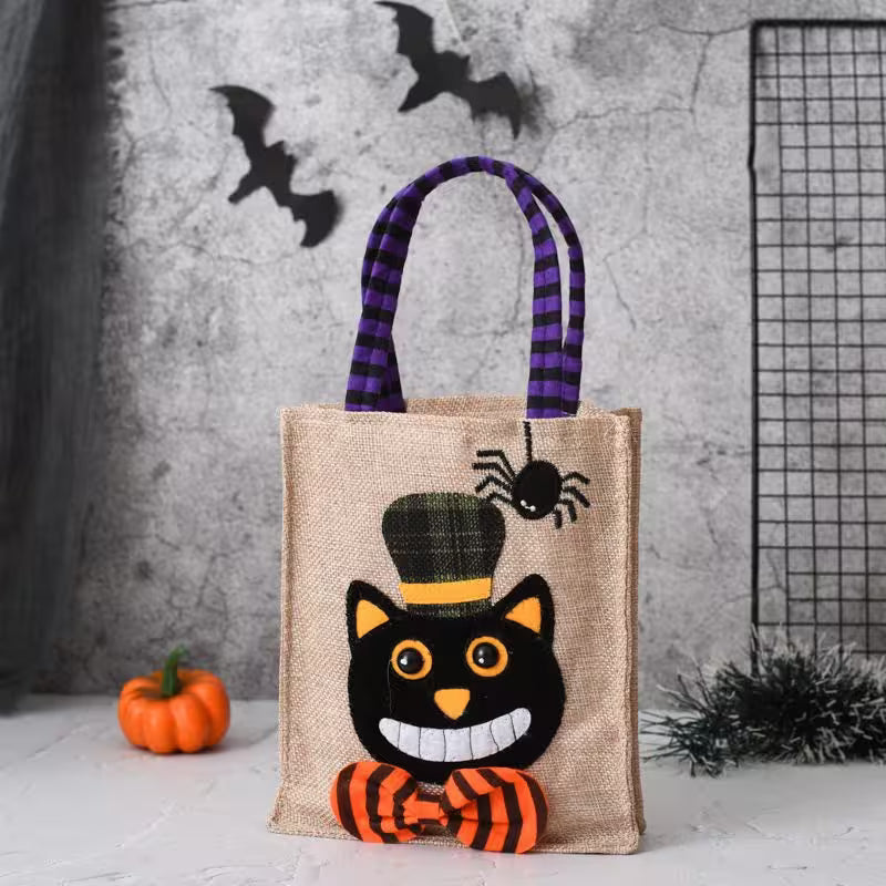 Halloween-themed tote bag with a black cat design on a gray background