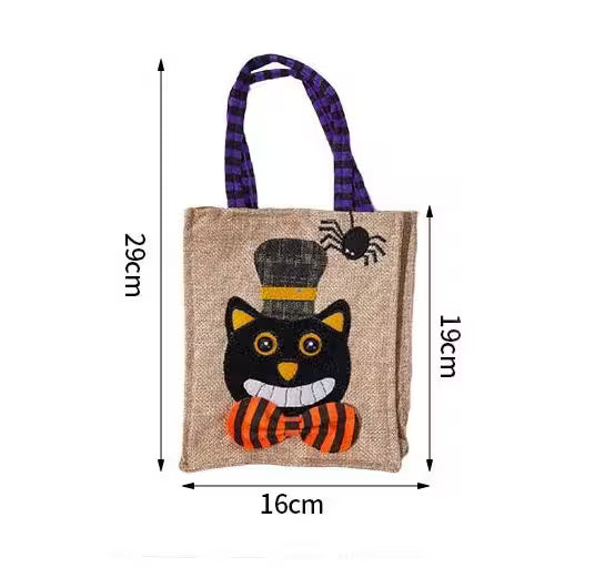 Halloween-themed bag with a black cat design, spider, and top hat, with measurements on a white background.