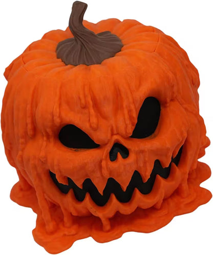 Pumpkin-shaped mask with a carved face on a white background