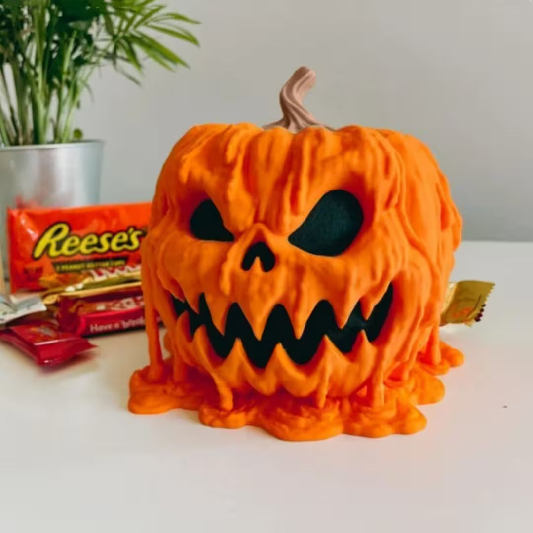 Halloween-themed cake with candy in the background