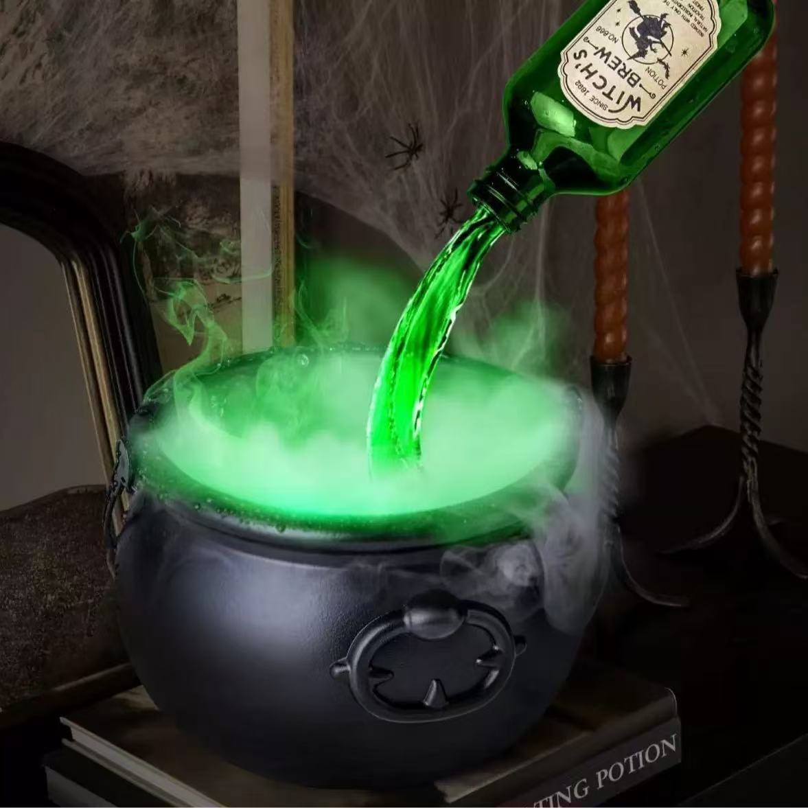 Green liquid being poured into a cauldron with a bottle labeled 'Witch's Brew' on a dark background.