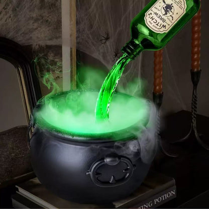 Green liquid being poured into a cauldron with a bottle labeled 'Witch's Brew' on a dark background.