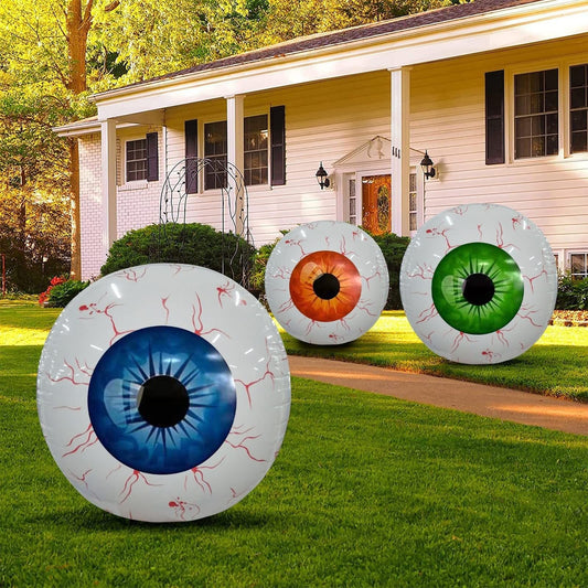 Inflatable eyeball decorations in front of a house