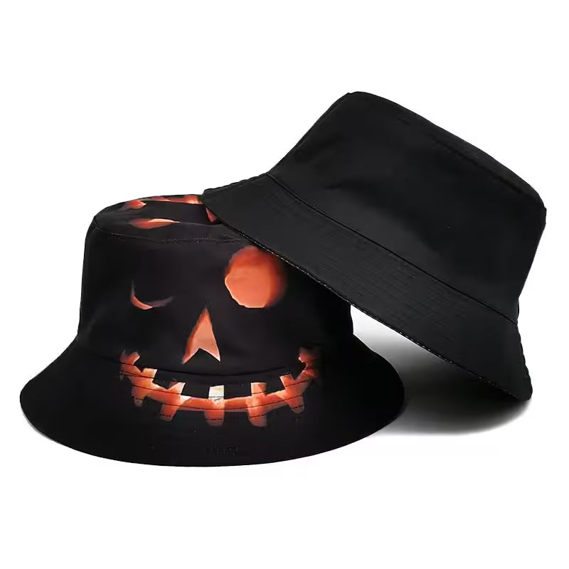 Black bucket hat with pumpkin face design on a white background