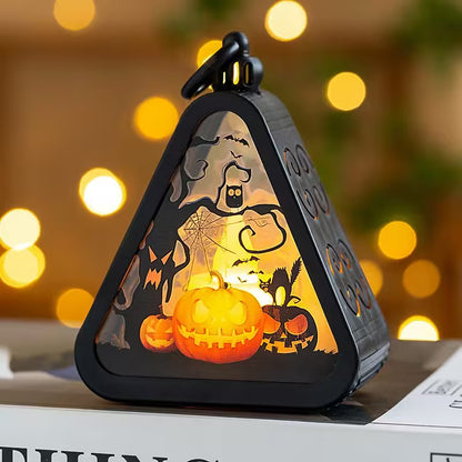 Halloween-themed decorative light with pumpkins and ghosts on a blurred background