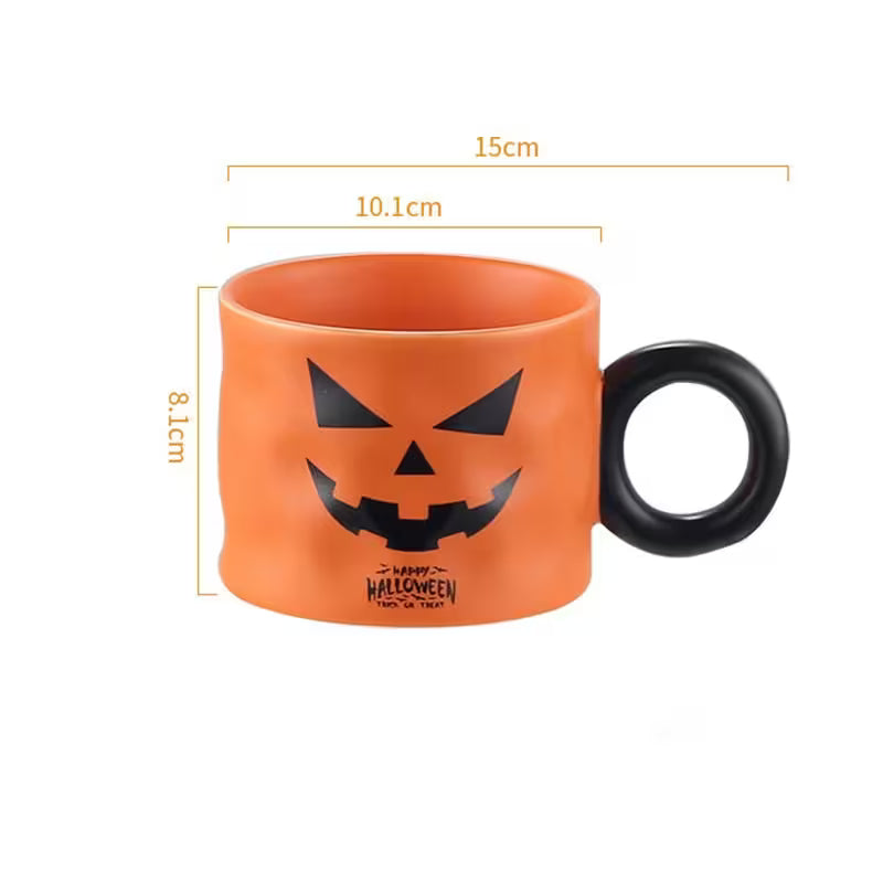 Orange mug with black handle and Halloween design, shown with measurements on a white background.