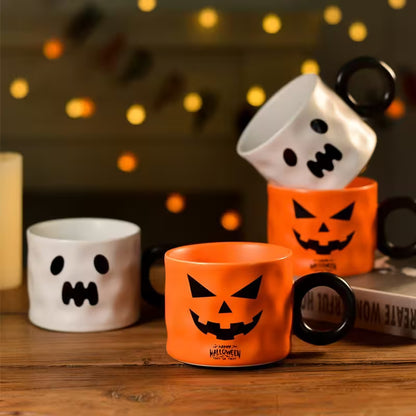 Halloween-themed mugs with ghost and jack-o'-lantern designs on a wooden surface.