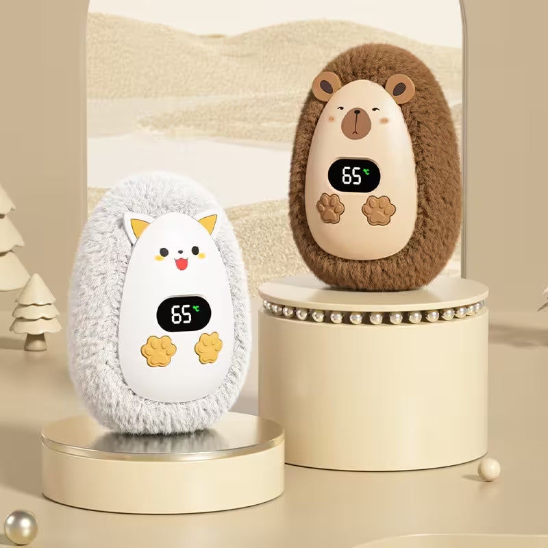 Two cute animal-shaped digital thermometers on a beige surface with a soft background.