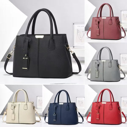 Collage of black, red, gray, beige, and blue handbags on a white background.