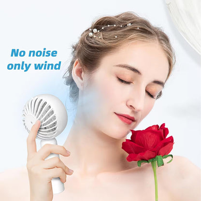 Woman holding a white handheld device with a red rose, against a light blue background.