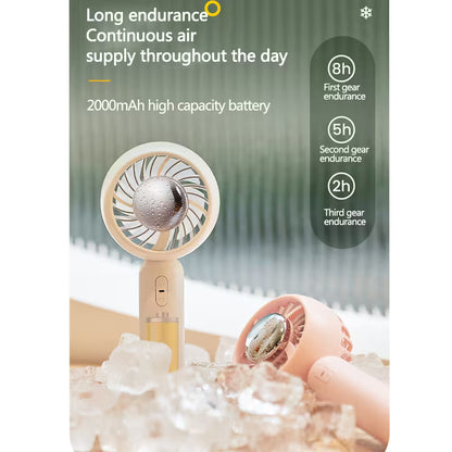 Handheld fan with battery capacity display on a blurred background