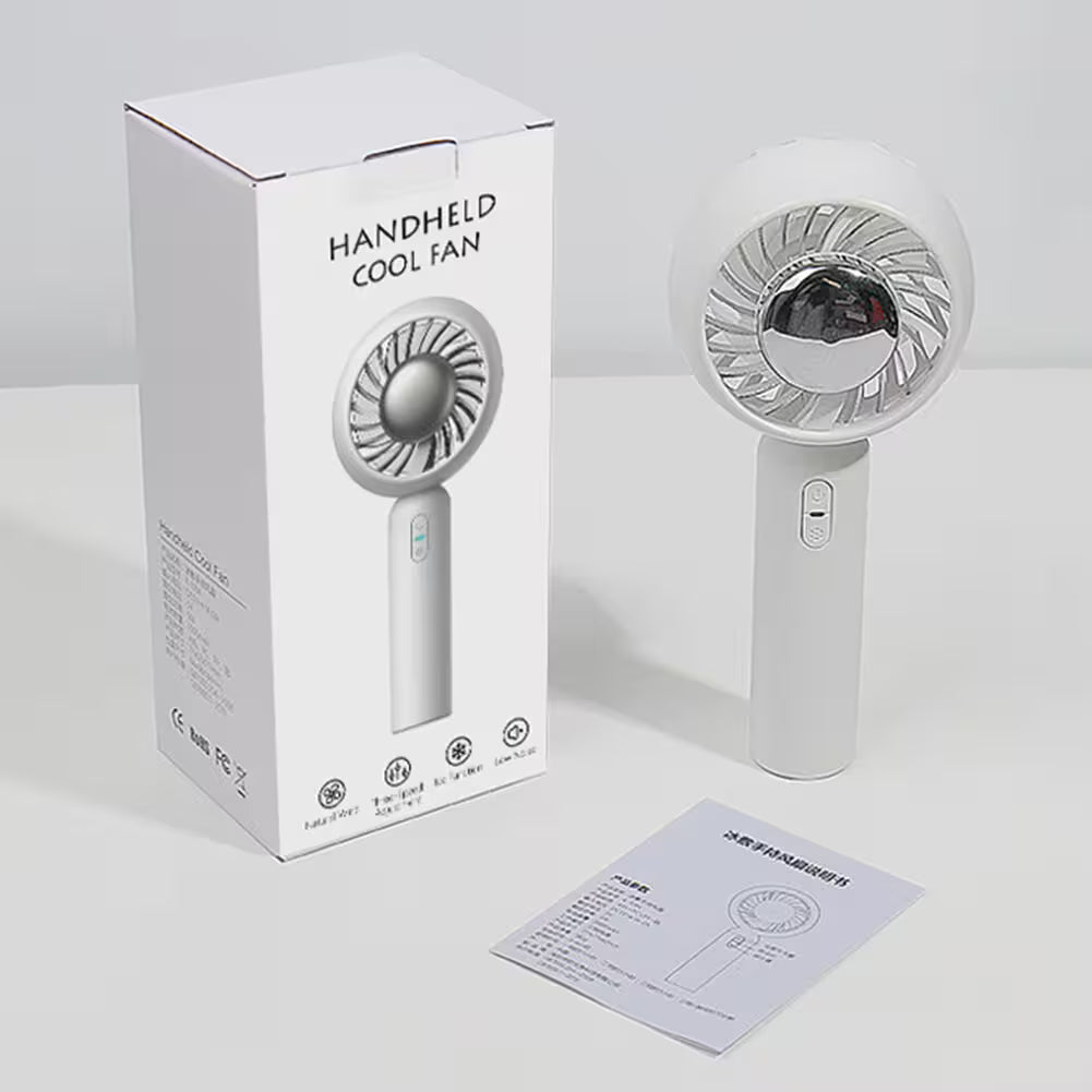 Handheld cool fan with packaging and user manual on a white background