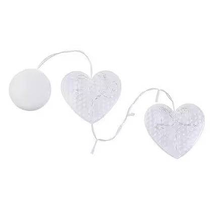 Heart-shaped white lanterns on a white background