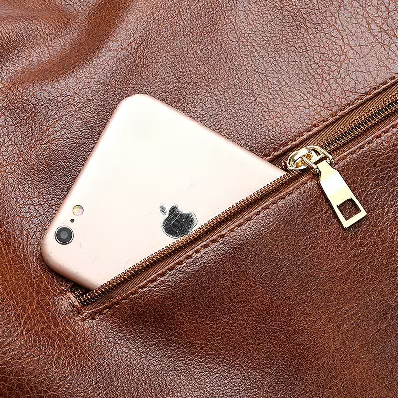 Rose gold phone in a brown leather pouch with zipper
