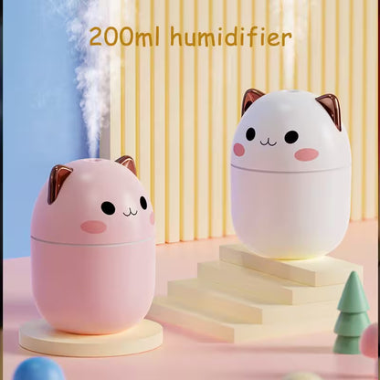 Two cute cat-shaped humidifiers on a pastel background with text indicating capacity.
