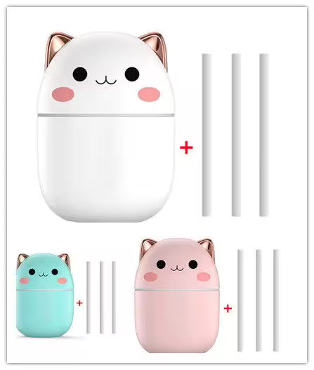 Set of cute cat-shaped airPod cases in white, pink, and blue with additional airPods on a white background.