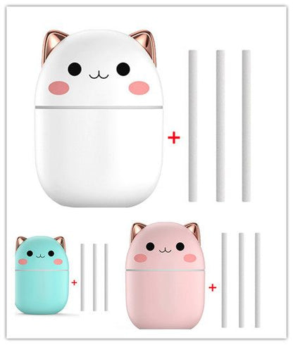 Set of cute cat-shaped containers with straws on a white background