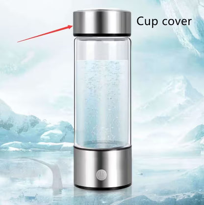 Glass water bottle with metal cap on a icy background