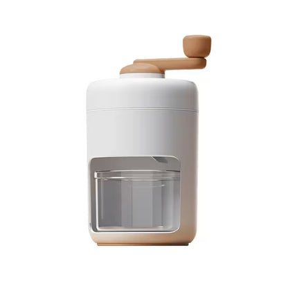 White and beige kitchen appliance with a clear glass compartment on a white background