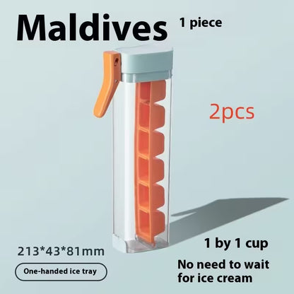 Ice cube tray with orange cubes on a light gray background, labeled 'Maldives'.
