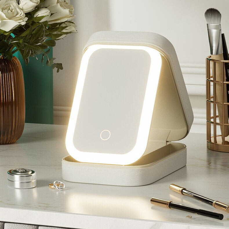 Illuminate your beauty routine and keep your makeup organized with this LED Makeup Mirror with Storage Box