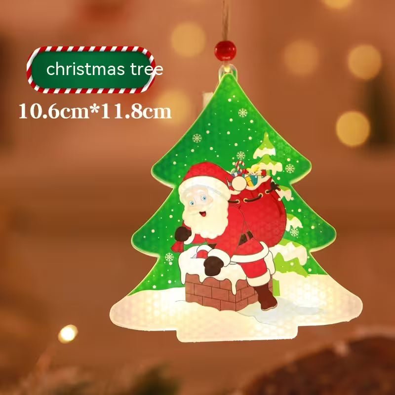 Decorative Christmas tree ornament with Santa Claus and reindeer on a blurred background
