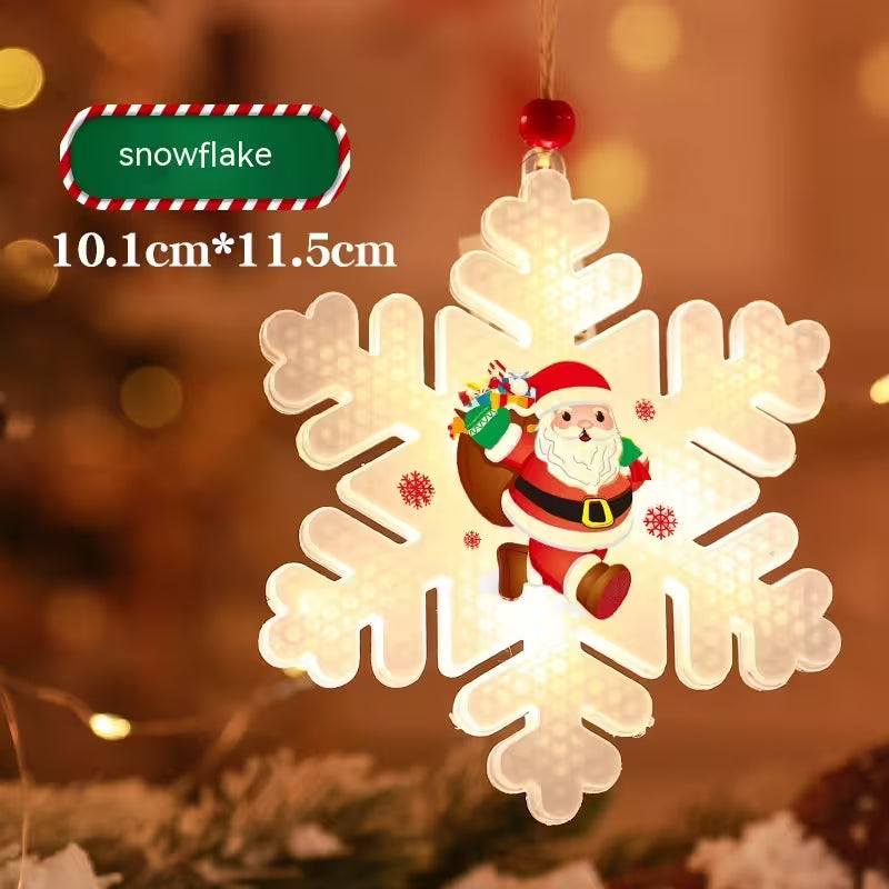 Snowflake-shaped Christmas ornament with Santa Claus design, size 10.1cm*11.5cm, on a blurred festive background.