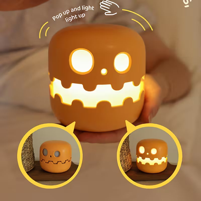 Halloween-themed night light with pop-up design and glowing face