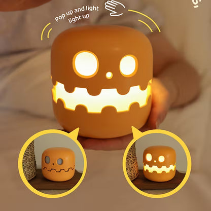 Halloween-themed night light with pop-up design and glowing face