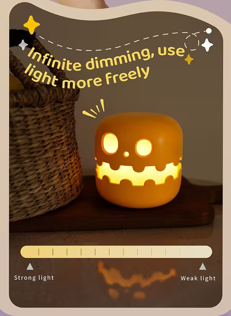 Halloween-themed night light with dimming control interface on a wooden surface.