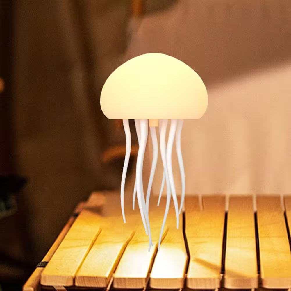 Jellyfish-shaped lamp on a wooden surface with a blurred background