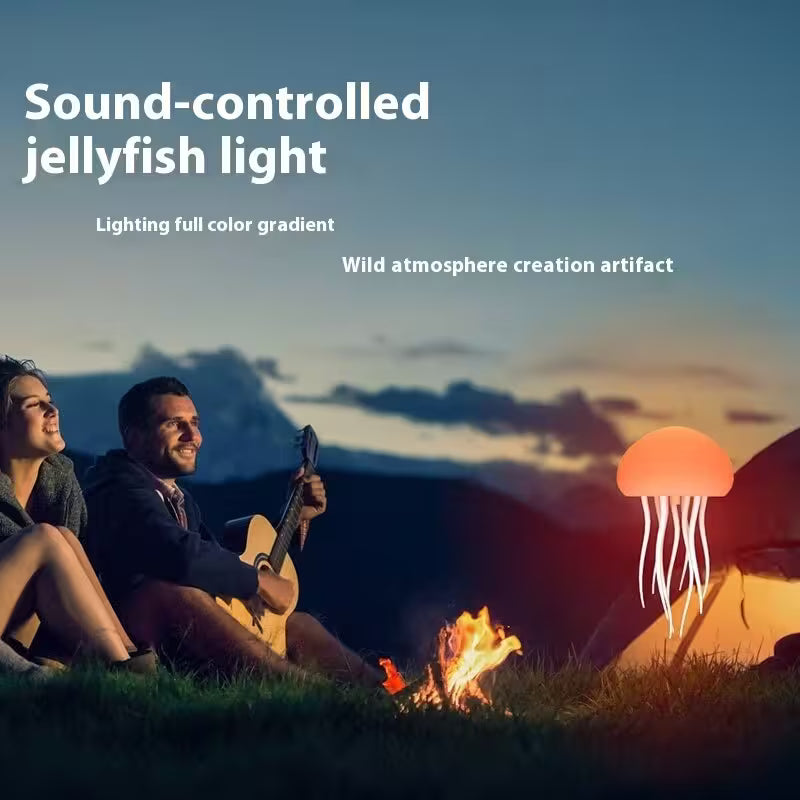 Two people sitting by a campfire with a sound-controlled jellyfish light in the foreground.