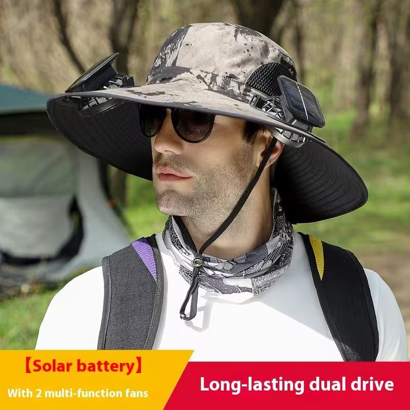 Man wearing a camouflage sun hat with solar battery and fans in a forest setting