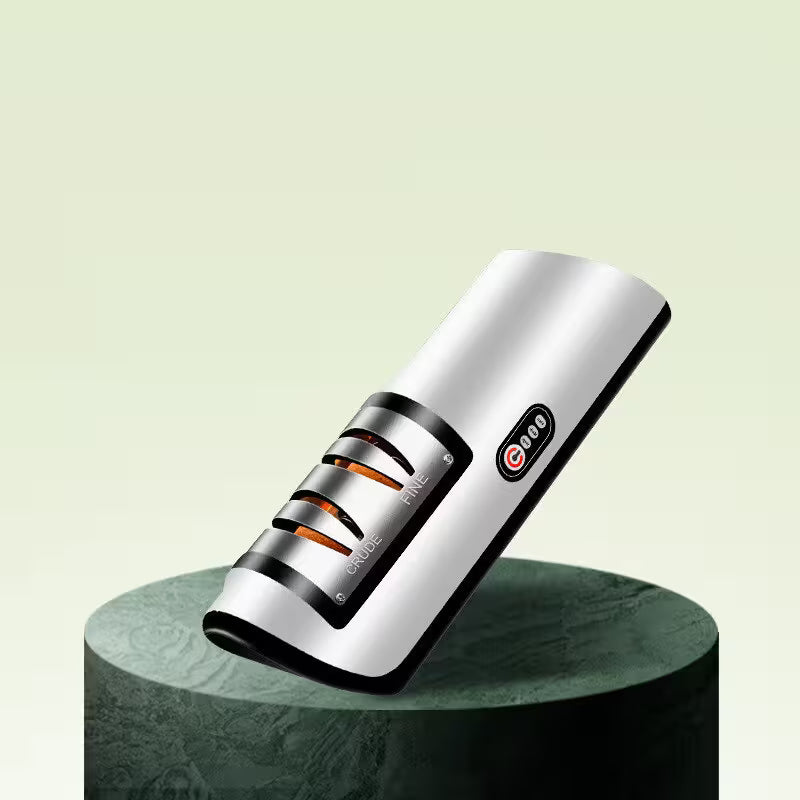 Knife sharpener on a green pedestal with a light green background