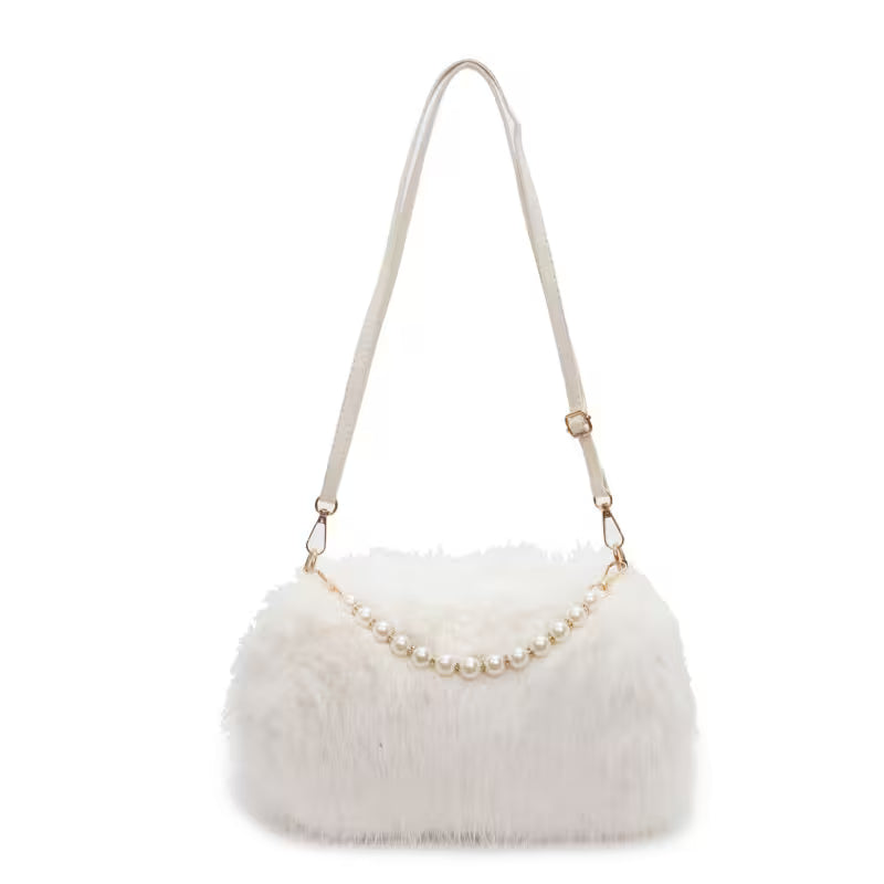 White fur handbag with pearl chain on a white background
