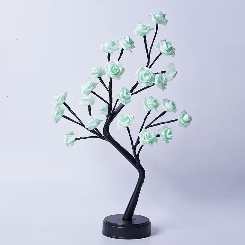 Decorative tree with light blue flowers on a white background