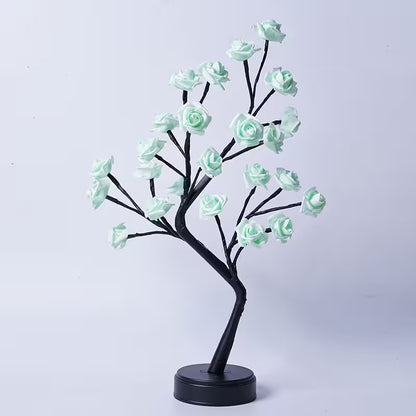 Decorative tree with light blue flowers on a white background